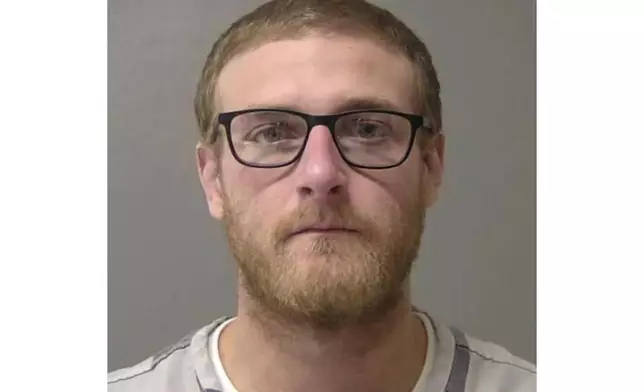 FILE - This booking photo provided by the Macon County, Ill., Jail in January 2025, shows Sean Grayson, a former Sangamon County Sheriff's deputy who is charged with first-degree murder in the shooting death of Sonya Massey on July 6, 2024, in Springfield, Ill. (Macon County Jail via AP, File)