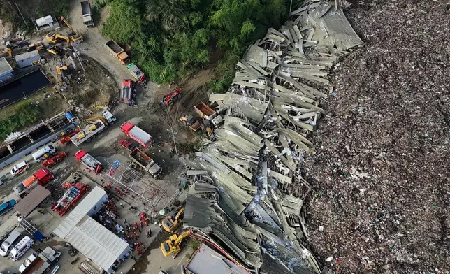 An aerial view of a huge mound of garbage that collapsed at a waste segregation facility in Binaliw, Cebu city on Friday, Jan. 9, 2026. (AP Photo/Jacqueline Hernandez)