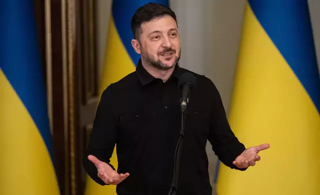 Ukraine's President Volodymyr Zelenskyy speaks during a briefing in Kyiv, Ukraine, Saturday, Jan. 3, 2026. (AP Photo/Danylo Antoniuk)