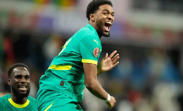 Senegal's Ibrahim Mbaye celebrates after scoring during the Africa Cup of Nations best of 16 soccer match between Senegal and Sudan in Tangier, Morocco, Saturday, Jan. 3, 2026. (AP Photo/Mosa'ab Elshamy)