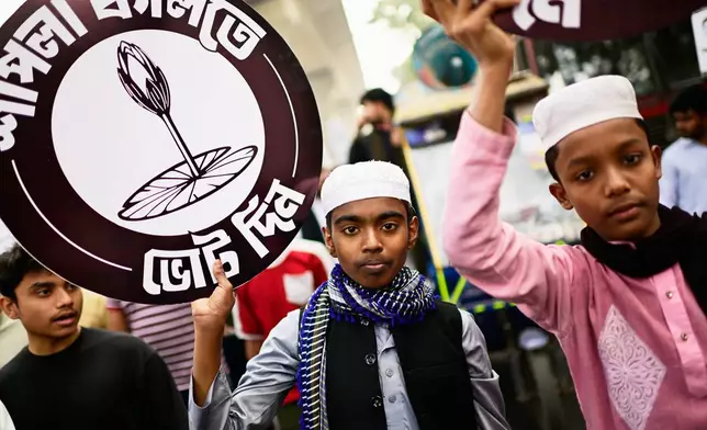 Supporters of Bangladesh's National Citizen Party hold a campaign rally ahead of next month's national elections in Dhaka, Bangladesh, Thursday, Jan. 22, 2026. (AP Photo/Mahmud Hossain Opu)