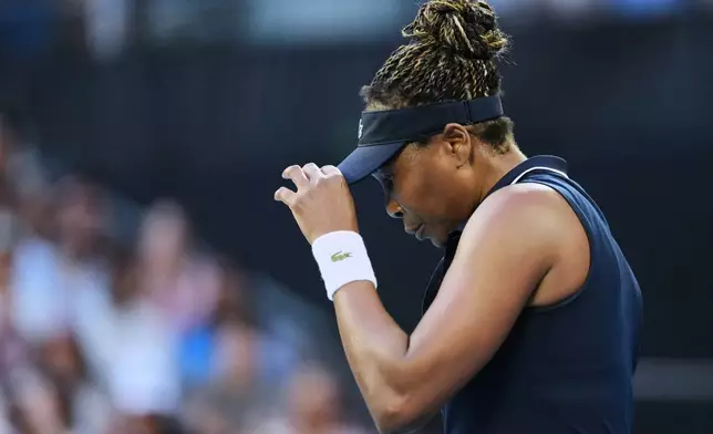 Venus Williams of the U.S. reacts during her first round match against Olga Danilovic of Serbia at the Australian Open tennis championship in Melbourne, Australia, Sunday, Jan. 18, 2026. (AP Photo/Aaron Favila)