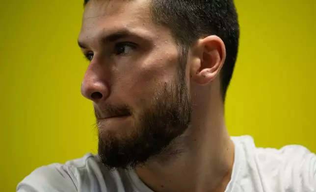 Russian ski mountaineer Nikita Filippov trains at Mount Elbrus foothills in Terskol village, the Kabardino-Balkarian Republic, Russia, Wednesday, Oct. 29, 2025. (AP Photo/Pavel Bednyakov)