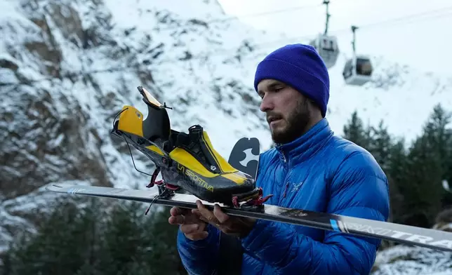 Russian ski mountaineer Nikita Filippov poses during an interview with The Associated Press at Mount Elbrus foothills in Terskol village, the Kabardino-Balkariian Republic, Russia, Wednesday, Oct. 29, 2025. (AP Photo/Pavel Bednyakov)