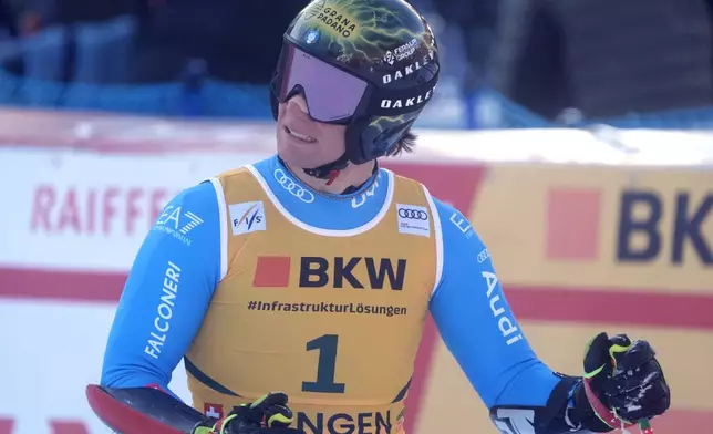 Italy's Giovanni Franzoni reacts at finish line during an alpine ski, men's World Cup super-G, in Wengen, Switzerland, Friday Jan. 16, 2026. (AP Photo/Giovanni Zenoni)