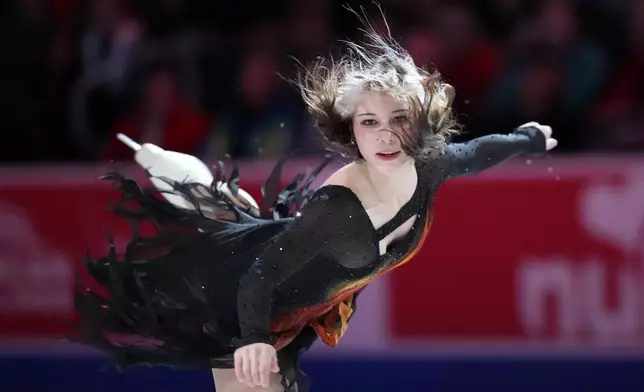 Alysa Liu skates during the "Making Team USA" performance at the U.S. Figure Skating Championships, Sunday, Jan. 11, 2026, in St. Louis. (AP Photo/Stephanie Scarbrough)