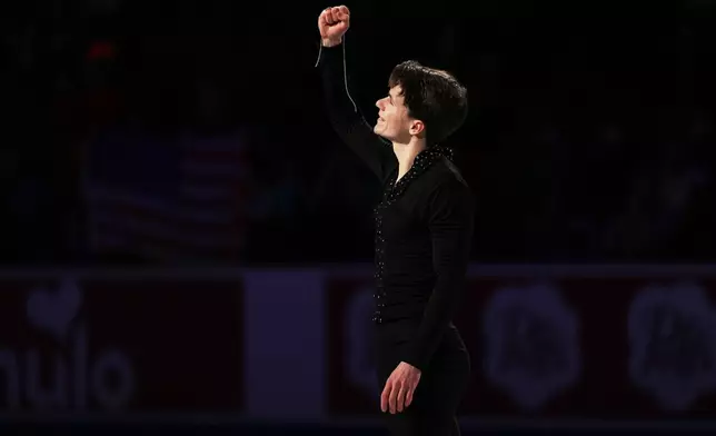 Maxim Naumov skates during the "Making Team USA" performance at the U.S. Figure Skating Championships, Sunday, Jan. 11, 2026, in St. Louis. (AP Photo/Stephanie Scarbrough)