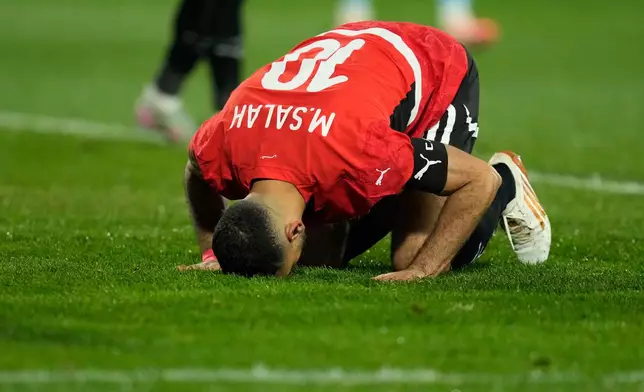 Egypt's Mohamed Salah celebrates after scoring his side's third goal during the Africa Cup of Nations quarterfinal soccer match between Egypt and Ivory Coast, in Agadir, Morocco, Saturday, Jan. 10, 2026. (AP Photo/Mosa'ab Elshamy)