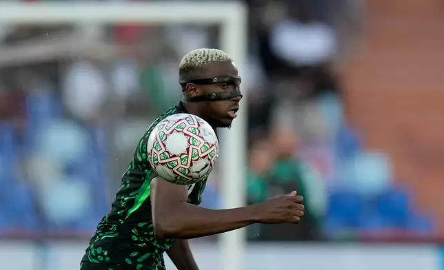 Nigeria's Victor Osimhen controls the ball during the Africa Cup of Nations quarterfinal soccer match between Nigeria and Algeria, in Marrakech, Morocco, Saturday, Jan. 10, 2026. (AP Photo/Themba Hadebe)