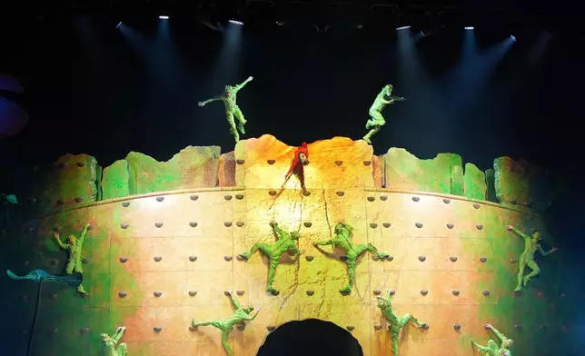 Acrobats from Cirque du Soleil rehearse for the show entitled 'Ovo' at The Royal Albert Hall, in London, Thursday, Jan. 8, 2026. (AP Photo/Kin Cheung)