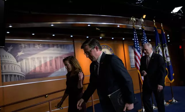 Speaker of the House Mike Johnson, R-La., center, House Republican Conference Chairwoman Lisa McClain, R-Mich., left, and House Majority Leader Steve Scalise, R-La., depart following a news conference at the Capitol, Wednesday, Jan. 7, 2026, in Washington. (AP Photo/Rod Lamkey, Jr.)