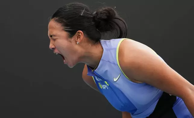 Alexandra Eala of the Philippines reacts during her first round match against Alycia Parks of the U.S. at the Australian Open tennis championship in Melbourne, Australia, Monday, Jan. 19, 2026. (AP Photo/Dar Yasin)