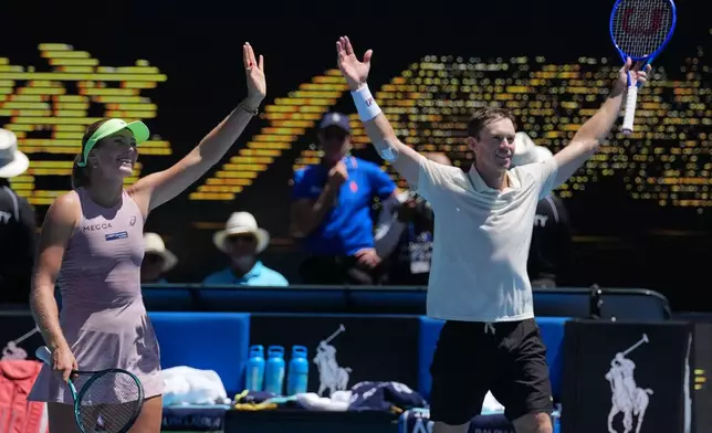 Australia's Olivia Gadecki and John Peers celebrate after defeating France's Kristina Mladenovic and Manuel Guinard in the mixed doubles final at the Australian Open tennis championship in Melbourne, Australia, Friday, Jan. 30, 2026. (AP Photo/Dita Alangkara)