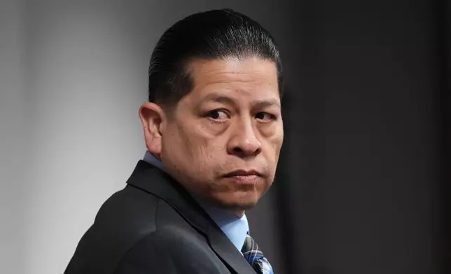 Former Uvalde school district police officer Adrian Gonzales arrives in the courtroom at the Nueces County Courthouse in Corpus Christi, Texas, Tuesday, Jan. 6, 2026. (AP Photo/Eric Gay, Pool)