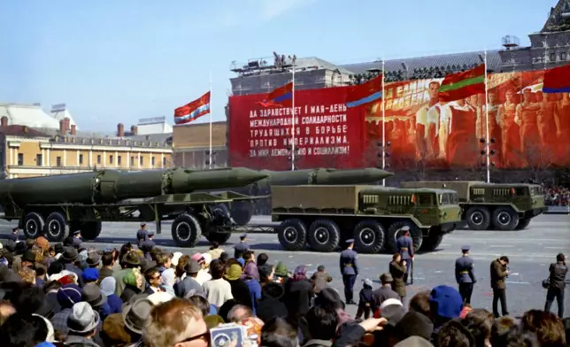 FILE - Nuclear missiles are paraded through Red Square in Moscow, Russia, during the Military May Day parade, May 1, 1988. (AP Photo/Boris Yurchenko, File)