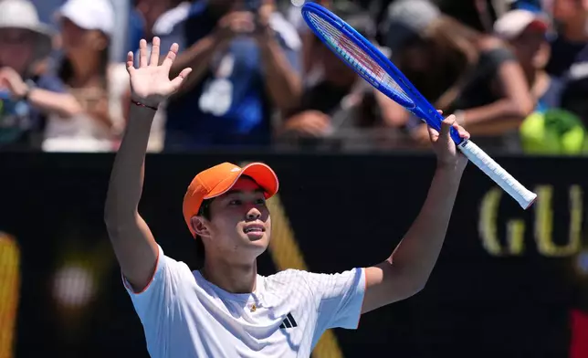 Learner Tien of the U.S. celebrates after defeating Nuno Borges of Portugal in their third round match at the Australian Open tennis championship in Melbourne, Australia, Friday, Jan. 23, 2026. (AP Photo/Dar Yasin)