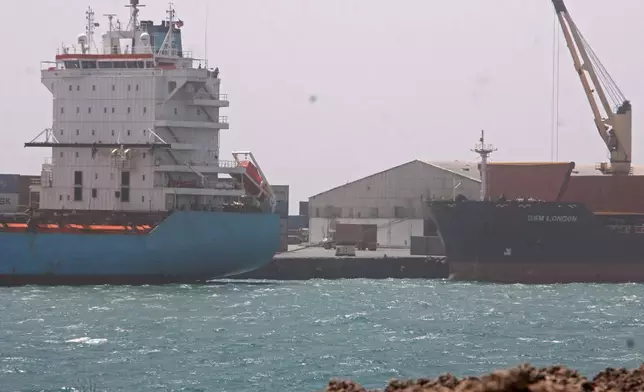 Cargo ships are docked at the port in Mogadishu, Somalia, Thursday, Jan. 8, 2026. (AP Photo/Farah Abdi Warsameh)