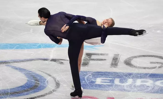 Germany's Minerva Fabienne Hase and Nikita Volodin compete during the Pairs Free Skating on day two of the ISU European Figure Skating Championships in Sheffield, England, Thursday, Jan. 15, 2026. (Mike Egerton/PA via AP)