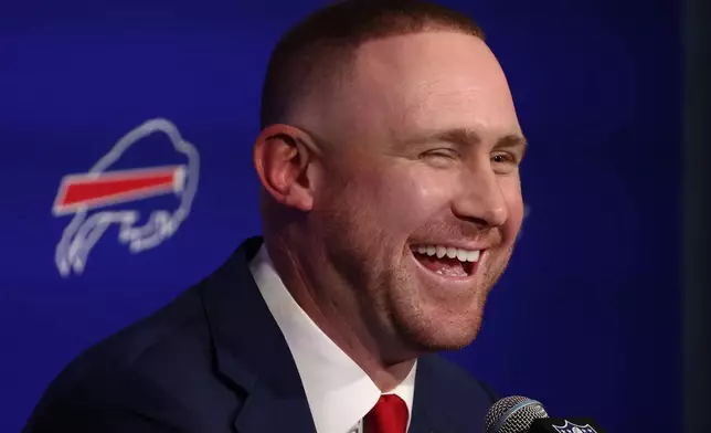 Joe Brady meets with reporters after being introduced as the new head coach of the Buffalo Bills in Orchard Park, N.Y., Thursday, Jan. 29, 2026. (AP Photo/Jeffrey T. Barnes)