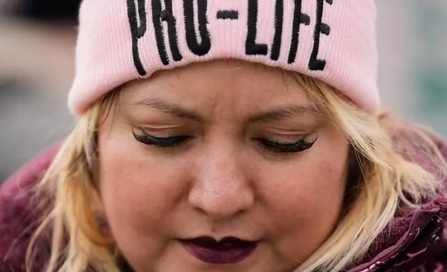 An anti-abortion demonstrator attends the annual March for Life, Friday, Jan. 23, 2026, in Washington. (AP Photo/Julia Demaree Nikhinson)