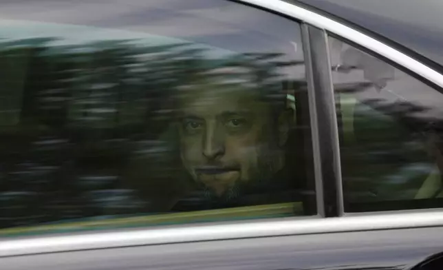 Ukraine's President Volodymyr Zelenskyy leaves the presidential palace after a meeting with his Cypriot counterpart Nikos Christodoulides in Nicosia, Cyprus, Wednesday, Jan. 7, 2026. (AP Photo/Petros Karadjias)