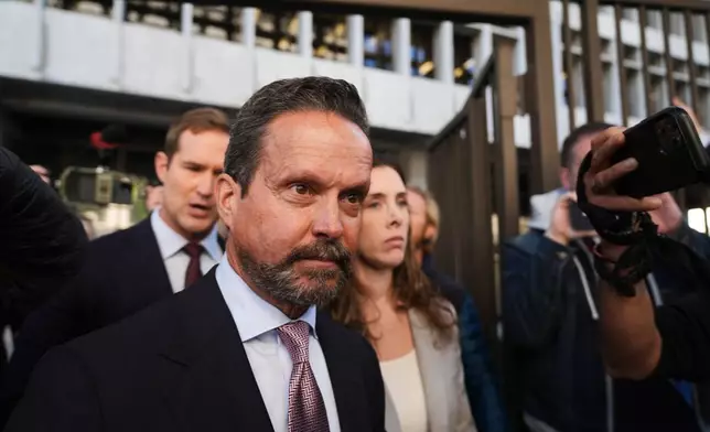 Alan Jackson, the attorney for Nick Reiner, leaves court after Reiner's arraignment on murder charges for the deaths of Rob and Michele Reiner Wednesday, Jan. 7, 2026, in Los Angeles. (AP Photo/Damian Dovarganes)