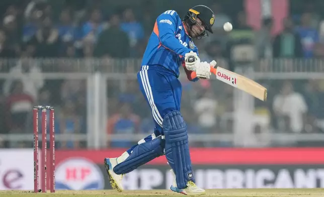 India's Abhishek Sharma plays a shot during the third T20 cricket match between India and New Zealand in Guwahati, India, Sunday, Jan. 25, 2026. (AP Photo/Anupam Nath)