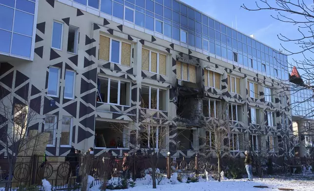 A damaged private clinic is seen after, according to Ukrainian officials, a Russian air attack when a drone hit a hospital room killing a patient, in Kyiv, Ukraine, Monday, Jan 5, 2026. (AP Photo/Efrem Lukatsky)