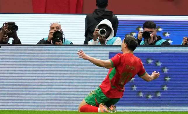 Morocco's Brahim Abdelkader Diaz celebrates after scoring the opening goal during the Africa Cup of Nations round of 16 soccer match between Morocco and Tanzania in Rabat, Morocco, Sunday, Jan. 4, 2026. (AP Photo/Mosa'ab Elshamy)