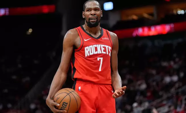 Houston Rockets forward Kevin Durant reacts to a foul call during the first half of an NBA basketball game against the Chicago Bulls in Houston, Tuesday, Jan. 13, 2026. (AP Photo/Ashley Landis)