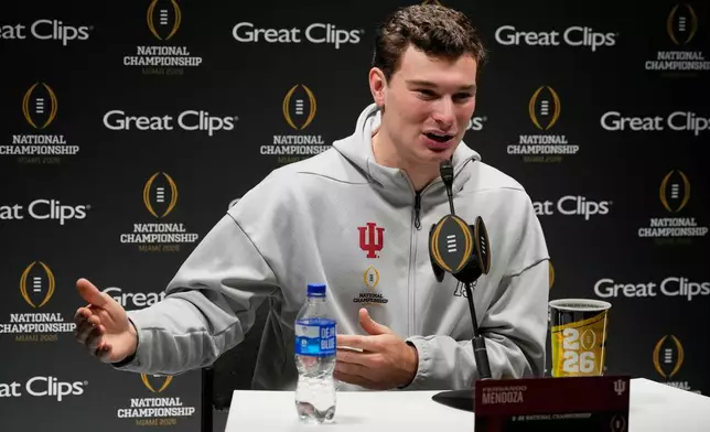 Indiana quarterback Fernando Mendoza speaks during media day ahead of the College Football Playoff national championship game between Miami and Indiana, Saturday, Jan. 17, 2026, in Miami. The game will be played on Monday. (AP Photo/Chris Carlson)