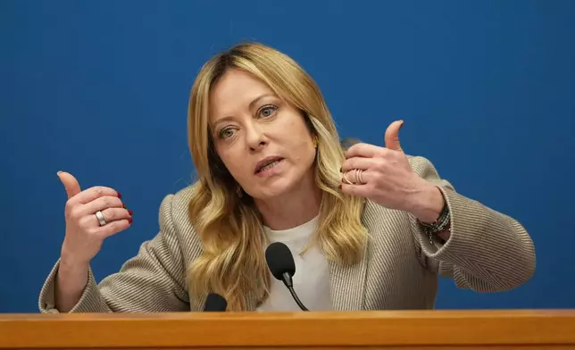 Italian Prime Minister Giorgia Meloni holds her annual start-of-the-year press conference in the press room at the Lower Chamber, in Rome, Friday, Jan. 9, 2026. (AP Photo/Andrew Medichini)