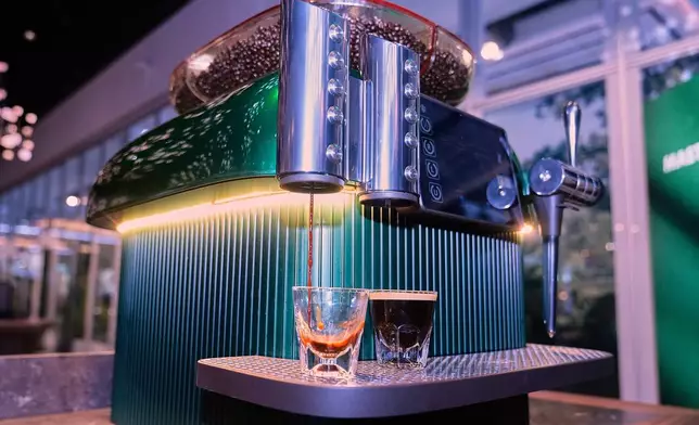 The Mastrena 3 espresso machine, a next-generation machine that will cut in half the 70 seconds it now takes to pull espresso shots, is displayed during the Starbucks Investor Day event in New York, Thursday, Jan. 29, 2026. (AP Photo/Richard Drew)