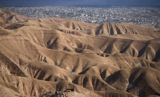 FILE - The Palestinian city of Jericho, seen from the Israeli settlement of Mitzpe Jericho in the West Bank, Dec. 28, 2025. (AP Photo/Ohad Zwigenberg, File)