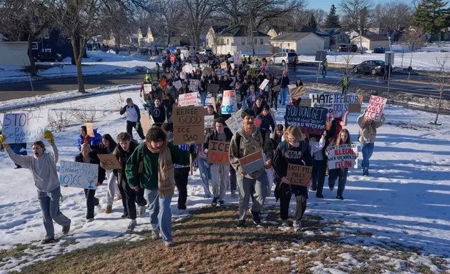 Students from Roosevelt High School protest during a walkout, Monday, Jan. 12, 2026, in Minneapolis. (AP Photo/Jen Golbeck)