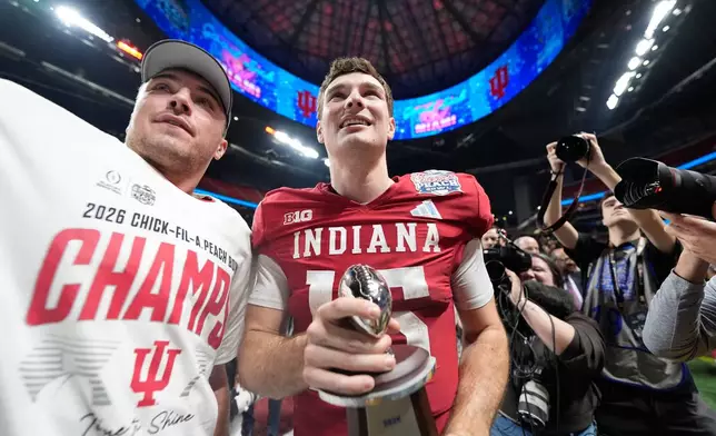 Indiana quarterback Fernando Mendoza (15) celebrates after the Peach Bowl NCAA college football playoff semifinal against Oregon, Friday, Jan. 9, 2026, in Atlanta. (AP Photo/Brynn Anderson)