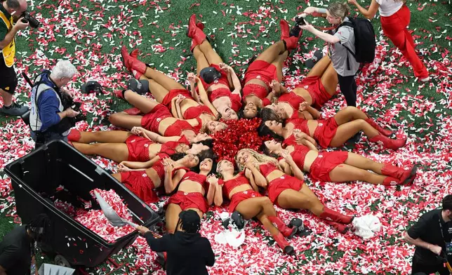 Indiana cheerleaders celebrate after the Peach Bowl NCAA college football playoff semifinal against Oregon, Friday, Jan. 9, 2026, in Atlanta. (AP Photo/Danny Karnik)