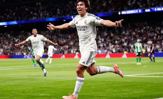 Real Madrid's Gonzalo Garcia celebrates after scoring his sides first goal during the Spanish La Liga soccer match between Real Madrid and Real Betis Sevilla in Madrid, Spain, Sunday, Jan. 4, 2026. (AP Photo/Pablo Garcia)
