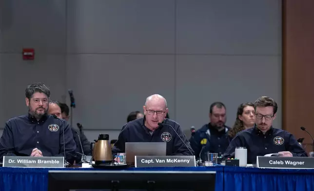 National Transportation Safety Board (NTSB) investigators William Bramble, from left, Captain Van McKenny and Caleb Wagner speak during the hearing on the midair aircraft collision that killed 67 people near Washington Reagan National Airport, in Washington, Tuesday, Jan. 27, 2026. (AP Photo/Jose Luis Magana)
