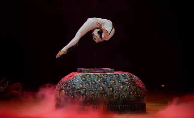 Acrobats from Cirque du Soleil rehearse for a show called "Ovo" at the Royal Albert Hall, in London, Thursday, Jan. 8, 2026. (AP Photo/Kin Cheung)