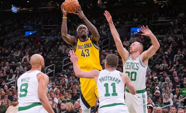 Indiana Pacers forward Pascal Siakam (43) drives to the basket against the Boston Celtics during the first half of an NBA basketball game, Wednesday, Jan. 21, 2026, in Boston. (AP Photo/Charles Krupa)