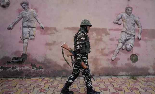 Indian soldier guard outside the venue of India's Republic Day parade in Srinagar, Indian controlled Kashmir, Monday, Jan. 26, 2026. (AP Photo/Mukhtar Khan)