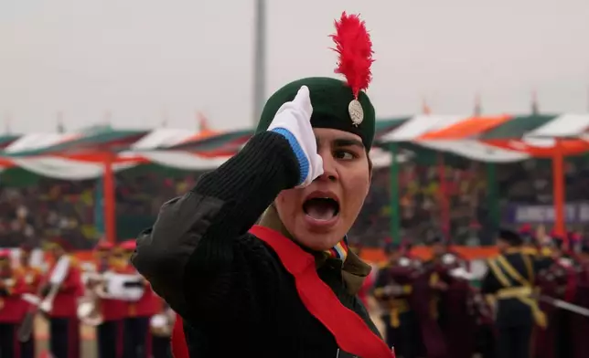 A cadet of the National Cadet Corps (NCC) shouts as she salute during the India's Republic Day parade in Srinagar, Indian controlled Kashmir, Monday, Jan. 26, 2026. (AP Photo/Mukhtar Khan)