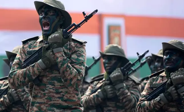An Indian army commando leads a parading contingent during the Republic Day ceremonial parade, in Kolkata, India, Monday, Jan. 26, 2026. (AP Photo/Bikas Das)