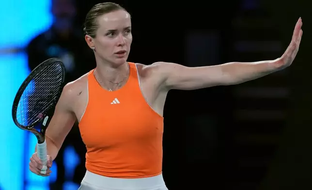 Elina Svitolina of Ukraine gestures during her semifinal match against Aryna Sabalenka of Belarus during their semifinal match at the Australian Open tennis championship in Melbourne, Australia, Thursday, Jan. 29, 2026. (AP Photo/Aaron Favila)