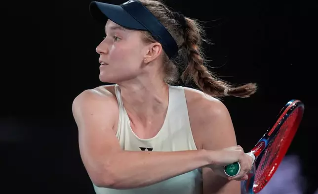 Elena Rybakina of Kazakhstan plays a forehand return to Jessica Pegula of the U.S. during their semifinal match at the Australian Open tennis championship in Melbourne, Australia, Thursday, Jan. 29, 2026. (AP Photo/Asanka Brendon Ratnayake)
