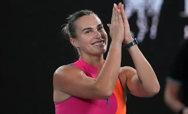 Aryna Sabalenka of Belarus celebrates after defeating Elina Svitolina of Ukraine in their semifinal match at the Australian Open tennis championship in Melbourne, Australia, Thursday, Jan. 29, 2026. (AP Photo/Dita Alangkara)