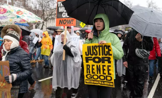 Demonstrators march outside the White House in Washington, Saturday, Jan. 10, 2026, against the Immigration and Customs Enforcement agent who fatally shot Renee Good in Minneapolis. (AP Photo/Jose Luis Magana)