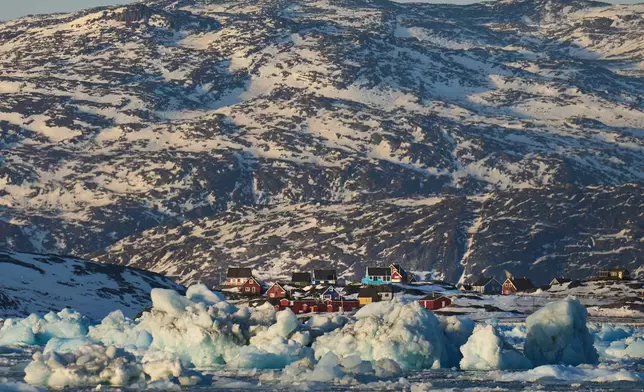 FILE - Pieces of ice move through the sea in Qoornoq Island, near Nuuk, Greenland, on Feb. 17, 2025. (AP Photo/Emilio Morenatti, File)