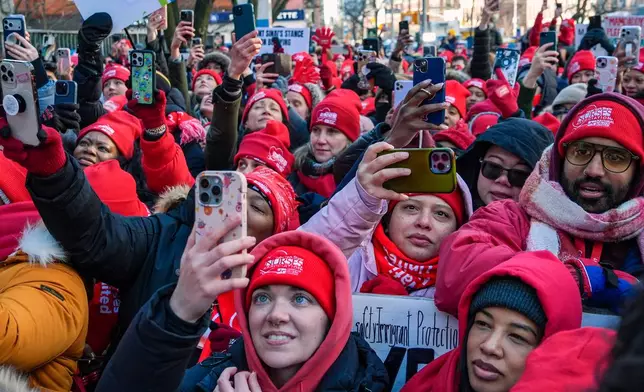 Members of the New York State Nurses Association union listen to Mayor Zohran Mamdani speak during.a picket outside Mount Sinai West Hospital, Tuesday, Jan. 20, 2026, in New York. (AP Photo/Ryan Murphy)